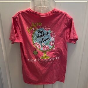 Simply Southern Small pink teacher " shape the world one child at a time" tee